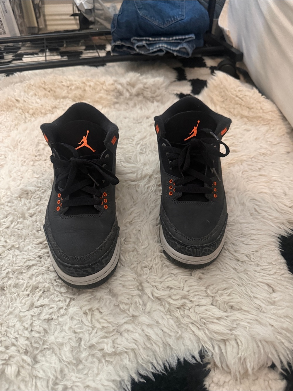 Jordan Black Sneakers with Orange Jumpman Accents
